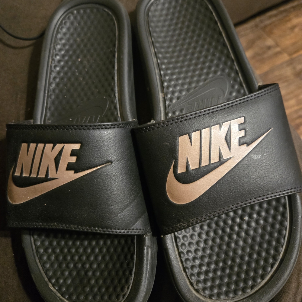 Nike Black and Gold Slides